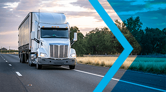 A white semi-truck, serving as a small-business-shipping-hub, drives on a highway with a blue graphical overlay on the right. The road is bordered by grass and trees under a cloudy sky.