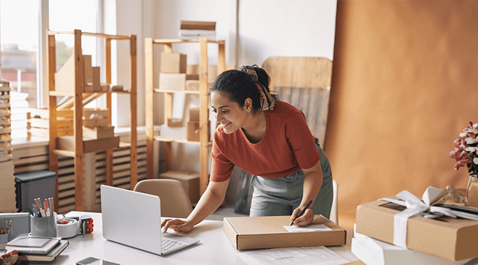 A collage with three panels: a delivery worker handling a package, a line of postal delivery trucks parked under a clear blue sky, and a postal worker looking away while holding an envelope.